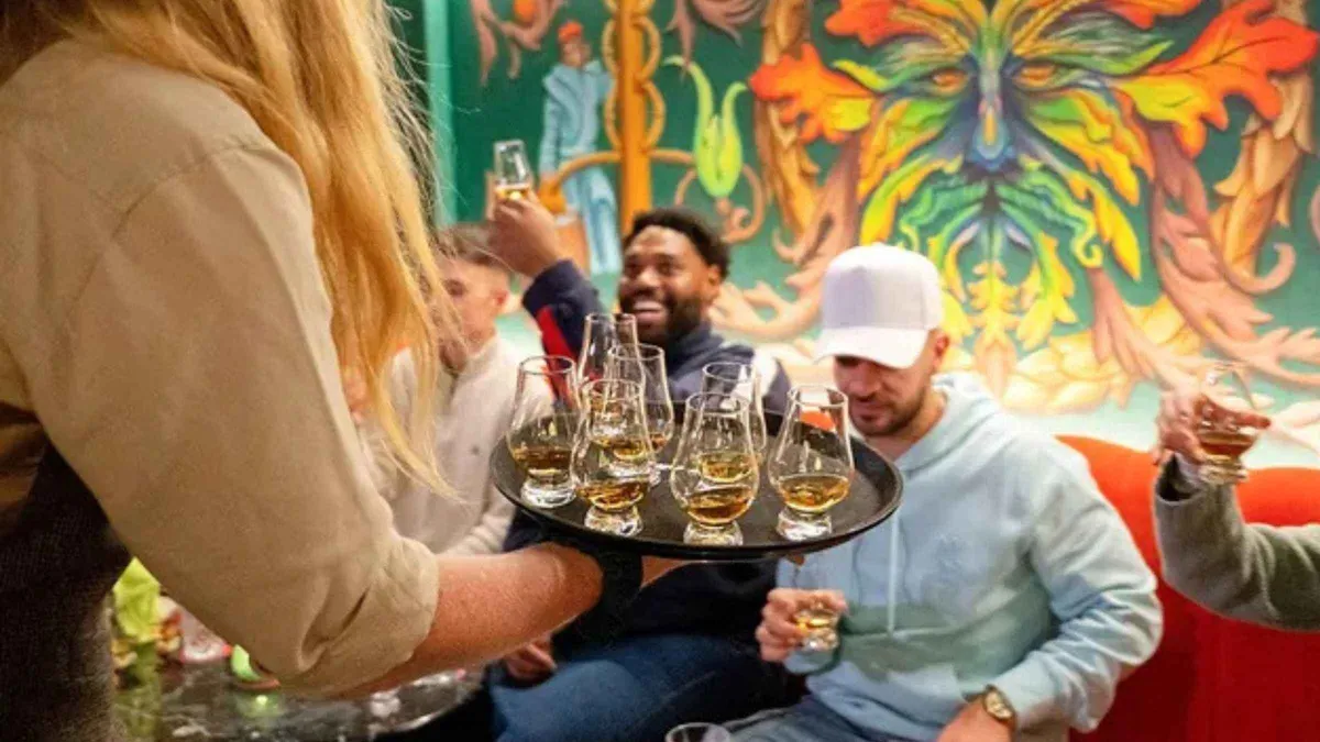 Four single malts poured with tasting notes in a private lounge on an Edinburgh whisky tasting with storytelling